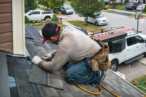 Professional Roof Replacement technician working in Parker City, IN